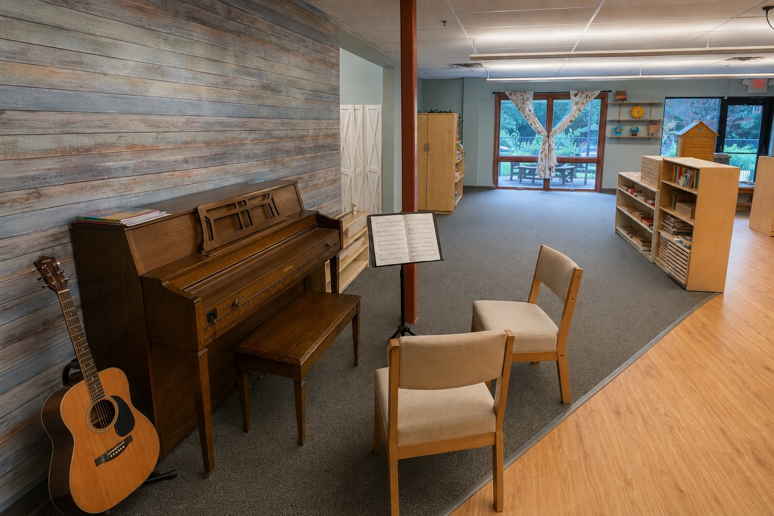 A lesson room with a piano, guitar, and sheet music stand
